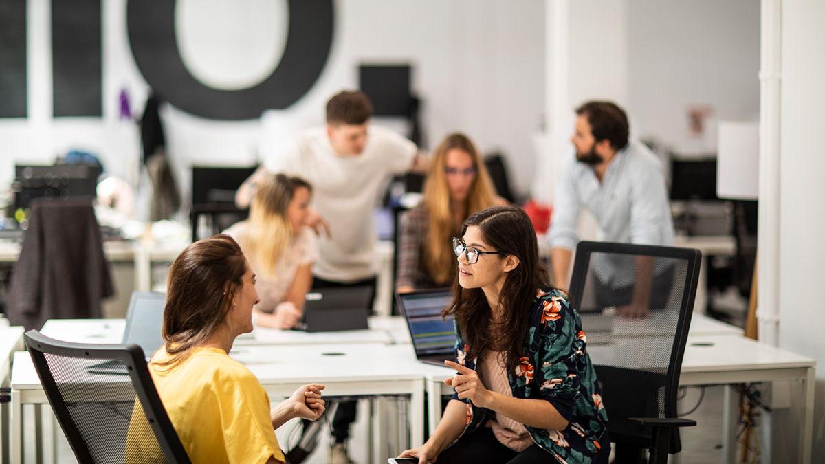 Young people working in an office environment.
